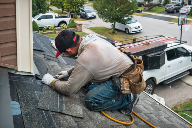 Professional Roof Leak Repair technician working in Merit, TX